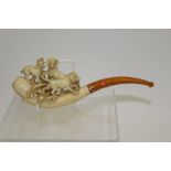 Fine quality carved meerschaum cheroot holder, circa 1890, carved with three hounds and foliage,