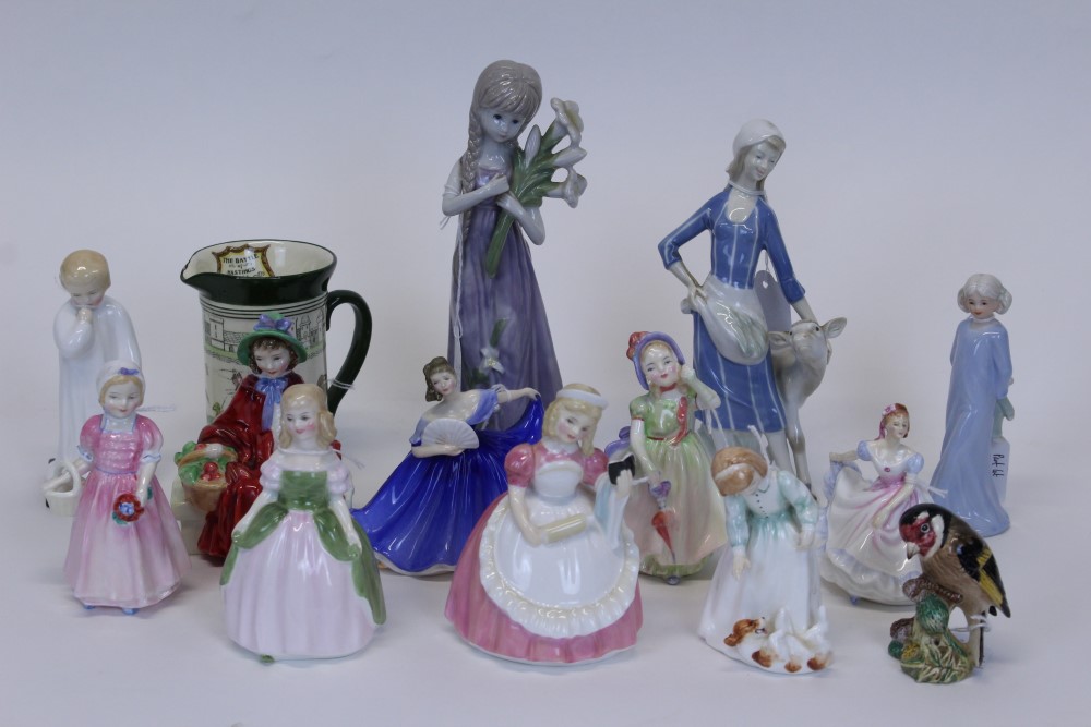 Nine Royal Doulton figures - Babie HN1679, Darling HN1985, Elaine HN3214, Penny HN2338,