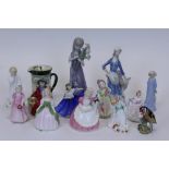 Nine Royal Doulton figures - Babie HN1679, Darling HN1985, Elaine HN3214, Penny HN2338,