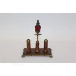 Early 20th century novelty oak and brass cigar lighter in the form of a street lamp,