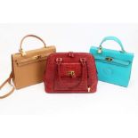 Marjaram red crocodile handbag with gilt padlock hardware detail,