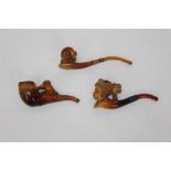 Unusual 19th century carved meerschaum pipe surmounted by gentleman in 18th century costume,