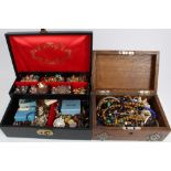 Two jewellery boxes containing costume jewellery, bead necklaces, clip-on earrings, etc,