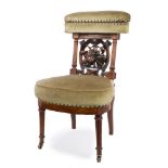 Extremely rare mid-Victorian rosewood smokers chair - the cushion upholstered top rail hinged to