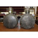 Two antique Chinese metal water carriers with wooden stops,