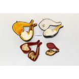 Two large 20th century meerschaum pipes in cases and fourteen small 19th century meerschaum cheroot