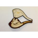 Late 19th century meerschaum cheroot holder carved with figure of Saint George slaying the dragon,