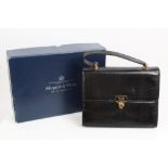 Mappin & Webb black lizard skin 'Kelly' style handbag with M.W.