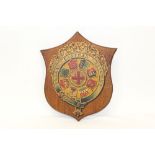 Great Eastern Railway shield decorated with town and country shields surrounded by a garter belt,