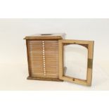 Wooden microscope slide cabinet with central carrying handle and seventeen drawers,
