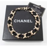 Chanel black silk ribbon gilt metal chain choker, with Authentication card,