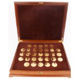 A collection of thirty-one silver gilt medallions - The Complete Works of Vermeer in an original