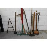 Large red painted multi-pronged plough,