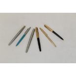 Three Parker fountain pens,