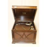 Early 20th century His Master's Voice table wind-up gramophone in an oak case,