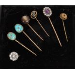 Group of six Victorian and later stick pins,