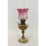 Victorian 'Veritas' oil lamp with circular burner and tube wick, brass reservoir,