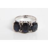 Ladies' three stone sapphire and diamond dress ring