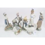 Lladro porcelain figure of a girl riding a donkey and a Lladro rabbit,