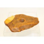 Large raw Baltic amber specimen of flattened form,