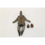 Naive carved and painted model of a dancing clown,