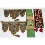 Two Victorian beadwork and tapestry fire screen panels / banners on brass rods,