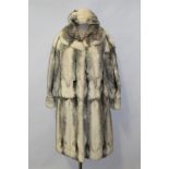 Ladies' silver fox fur coat and matching hat - initialled lining, by Hurtig Furrier,