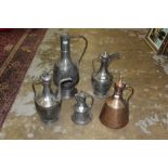 Six antique Turkish copper olive oil containers - various sizes,