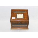 Victorian oak table letter box with front glass panel and scale of postal charges