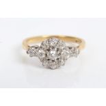 Gold (18ct) diamond flower-head cluster ring with nine old cut diamonds and an old cut diamond set