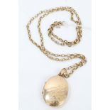 Gold (9ct) oval locket on gold (9ct) chain CONDITION REPORT Total gross weight