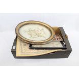 Regency embroidered silkwork oval study of flowers, in original gilt oval frame,