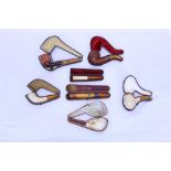 Collection of plain meerschaum pipes and cheroot holders - all cased,