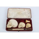 Unusual late 19th century graduated set of three meerschaum pipe / cheroot holders carved in the