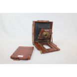 Lancaster Birmingham brass and mahogany field plate camera with ground-glass back and dark slide