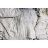 Selection of vintage white clothing, undergarments, nighties, petticoats, christening gown,