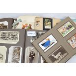 Postcards selection in albums - including topographical, children's, Mabel Lucie Attwell,