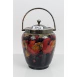 Moorcroft Pottery biscuit barrel decorated in the Pomegranate pattern,