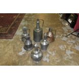 Five antique Turkish copper olive oil containers - various sizes,