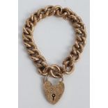 Gold (9ct) curb link chain bracelet with heart-shaped padlock CONDITION REPORT