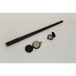 Pocket compass in a blackened metal case and one other,
