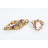 Victorian gold (9ct) floral scroll brooch set with seed pearls and two purple stones,