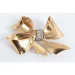 1940s yellow metal bow brooch set with diamonds around the centre CONDITION REPORT