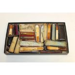 Fourteen late 19th / early 20th century meerschaum and other cigarette / cheroot holders in fitted