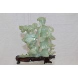 Chinese carved green jade statuette of a lady with miniature tree on a stand with two birds,