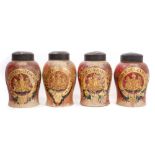 Rare set of four Victorian retailers' painted stoneware tobacco jars, each of swollen baluster form,