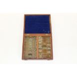 Collection of microscope slides in a mahogany case