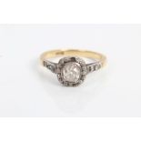 Victorian diamond cluster ring with a central old cut diamond estimated to weigh approximately 0.