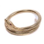 Gold (9ct) snake bangle with ruby eyes CONDITION REPORT Bangle contains steel spring.