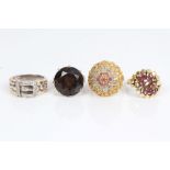 Yellow and white gold (9ct) diamond set buckle ring, rose gold (9ct) smoky quartz cocktail ring,